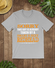 Load image into Gallery viewer, Sorry This Guy Is Already Taken By A Smart And Sexy Redhead Gift For Men Guys Tee