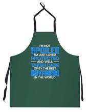 Load image into Gallery viewer, I'm Just Loved Protected And Well Taken Care Of By The Best Boyfriend Apron