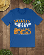 Load image into Gallery viewer, Sorry This Guy Is Already Taken By A Smart And Sexy Redhead Gift For Men Guys Tee