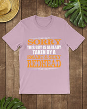 Load image into Gallery viewer, Sorry This Guy Is Already Taken By A Smart And Sexy Redhead Gift For Men Guys Tee