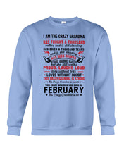 Load image into Gallery viewer, February Crazy Grandma Has Fought A Thousand Battles Cries For Birthday Gift Sweatshirt
