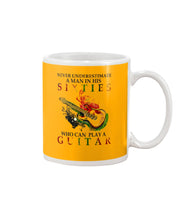 Load image into Gallery viewer, Never Underestimate A 60 Year Old Man Can Play A Guitar Mug
