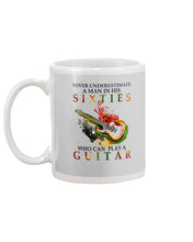 Load image into Gallery viewer, Never Underestimate A 60 Year Old Man Can Play A Guitar Mug
