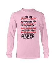 Load image into Gallery viewer, This Girl Has Fought A Thousand This Girl Was Born In March Unisex Long Sleeve
