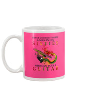 Load image into Gallery viewer, Never Underestimate A 60 Year Old Man Can Play A Guitar Mug

