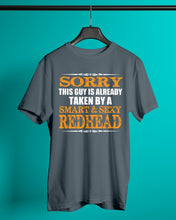 Load image into Gallery viewer, Sorry This Guy Is Already Taken By A Smart And Sexy Redhead Gift For Men Guys Tee
