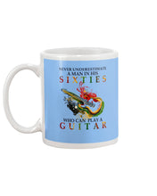 Load image into Gallery viewer, Never Underestimate A 60 Year Old Man Can Play A Guitar Mug
